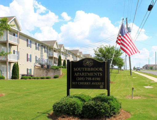 Southbrook Apartments entrance signage and American Flag