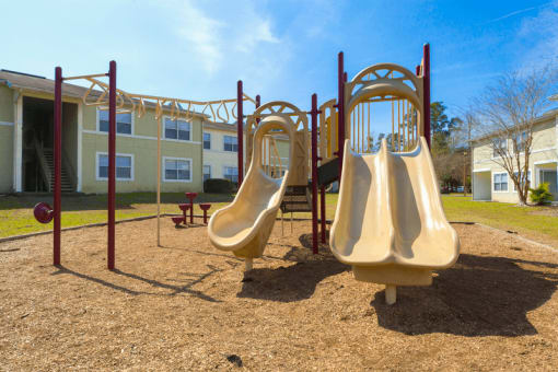 Outdoor playground area with slides