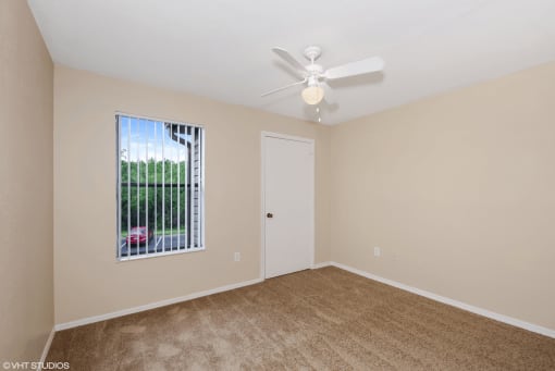 Bedroom with carpet flooring and multi speed ceiling fan