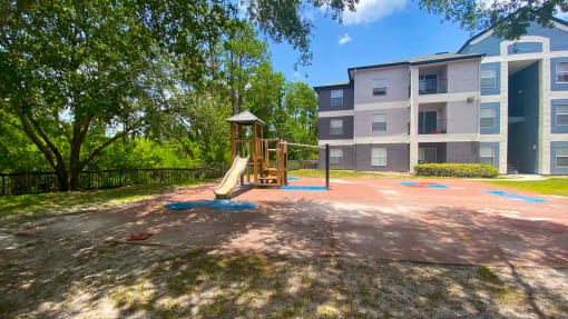 Outdoor playground with slide, latter, and monkey bars