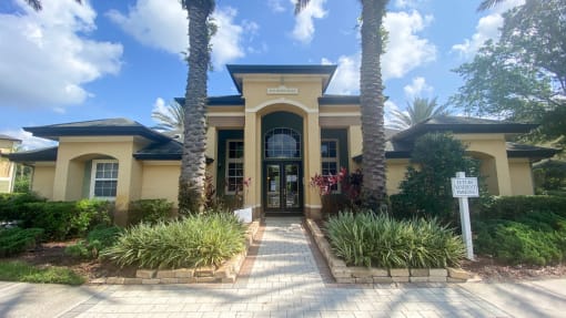 Leasing office exterior with native landscaping