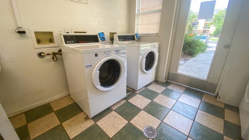 Clothing care center with washers, dryers, and folding station