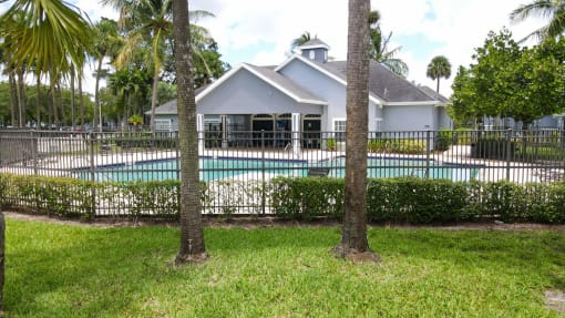 Fenced in Swimming Pool with Sundeck Next to Leasing Office