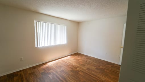Room with Hardwood Style Flooring and Window