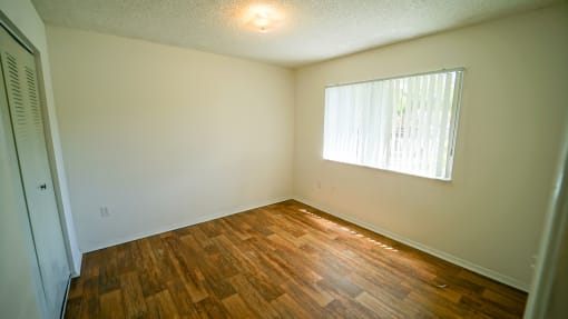 Room with Hardwood Style Flooring and Window