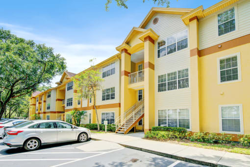 Building exterior and parking lot with native landscaping.