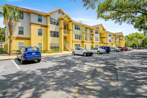 Building exterior and parking lot with native landscaping
