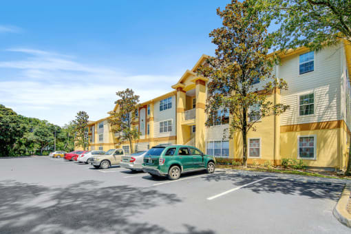 Building exterior and parking lot with native landscaping