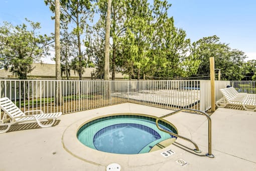 Heated spa on the pool deck.