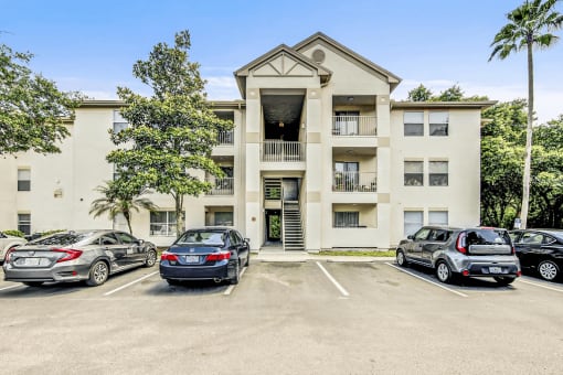 Building exterior with a parking lot.