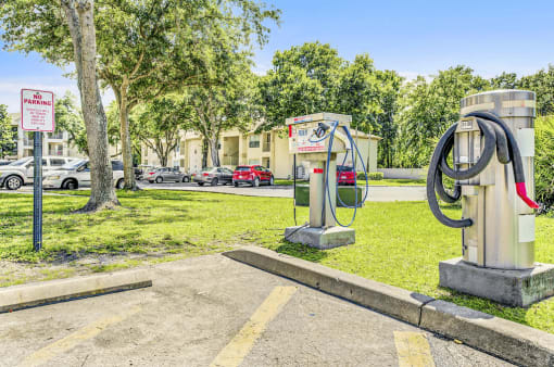 Car care center with vacuum and a car washing station.
