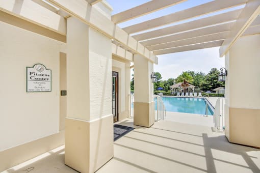 Walkway to the Fitness Center door and the entrance to the swimming pool area.