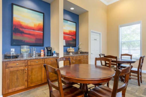 Clubhouse Seating Area with Art and Blue Accents