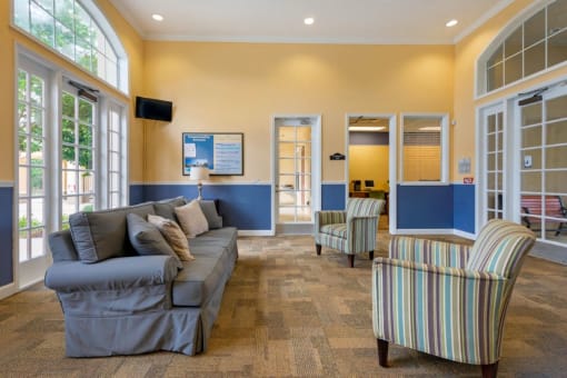 Clubhouse Seating Area with Large Windows and Natural Light