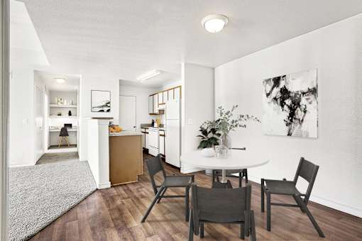 Dining area and kitchen with modern furnishings at Tierra Antigua Apartments, Mesa