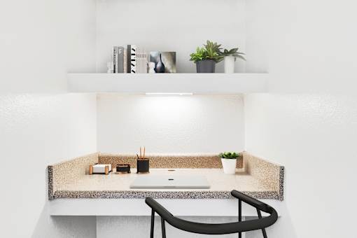 Built in desk area with shelf and chair at Tierra Antigua Apartments, Mesa, AZ 85207