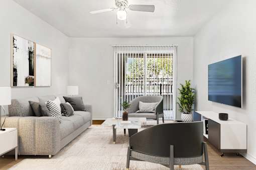 Living room with sliding glass door and ceiling fan at Tierra Antigua Apartments, ARIZONA, 85207