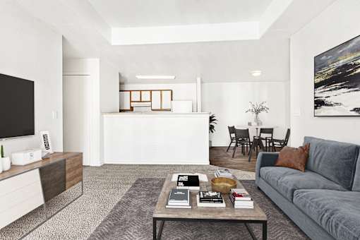 Living room with skylight and open kitchen view at Tierra Antigua Apartments, ARIZONA