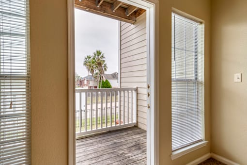 a view of the balcony from the living room