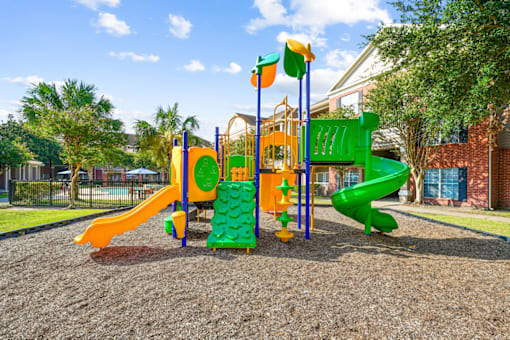 the playground at the whispering winds apartments in pearland, tx