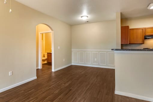 a kitchen and living room in a 555 waverly unit