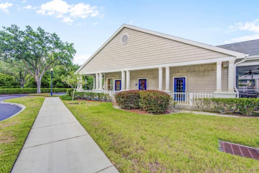 Clubhouse side view with surrounding native landscaping