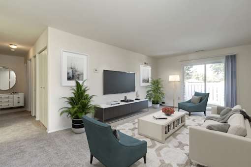 a living room filled with furniture and a flat screen tv