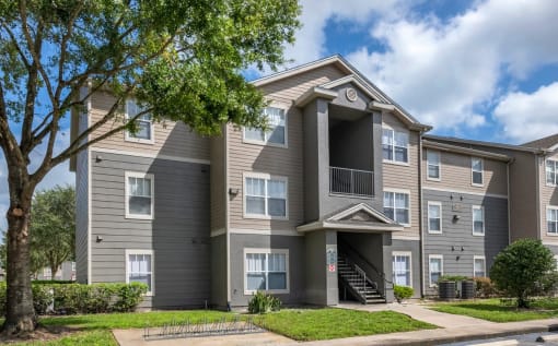 Apartment Building Exterior with Sidewalk