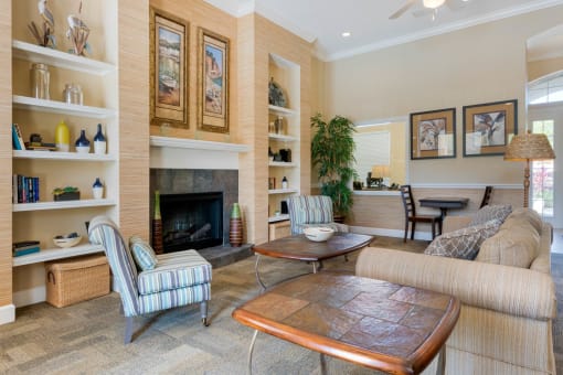 Club house lounge with couches, coffee table and rug