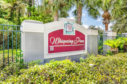 Monument Sign of property with landscaping