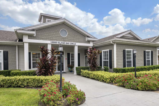 Leasing office exterior with native landscaping