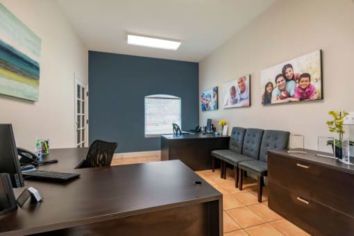 Leasing office with tile flooring, chairs, and desks