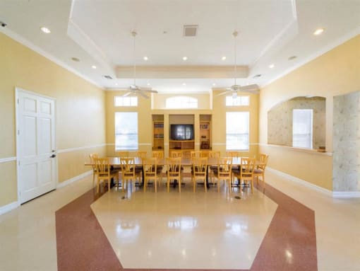 Bright Spacious Community Center with Large Table and TV