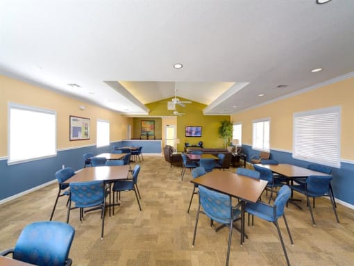 Clubhouse Lounge With Large Windows And Seating at Holly Cove Apartments, Florida, 32073