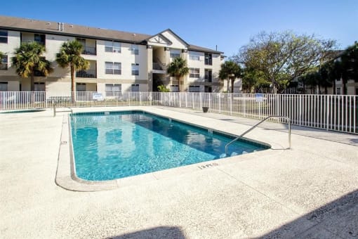 Gated swimming pool with sundeck