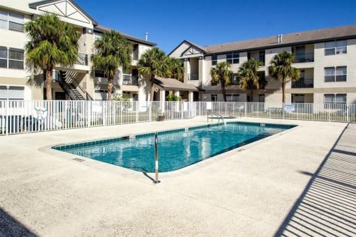 Gated swimming pool with sundeck