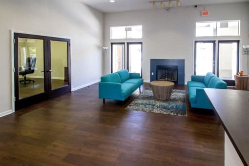 Interior leasing office seating area with two couches