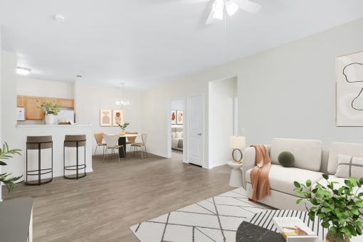 a living room and dining room with hardwood floors