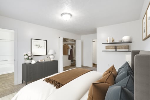 a bedroom with a large bed and a dresser in the corner