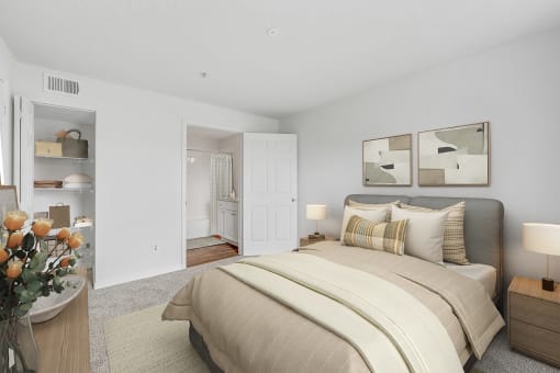 a bedroom with a bed and two night stands