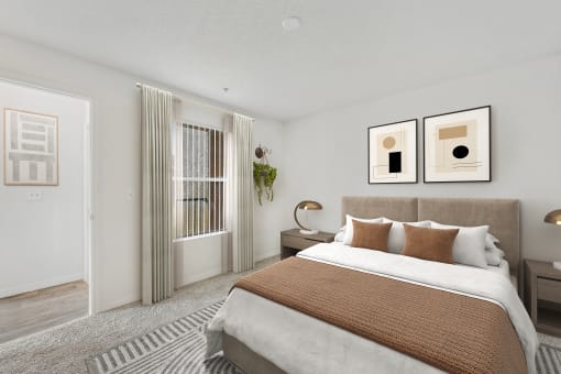 a bedroom with a large bed and a window
