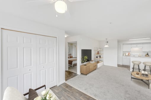 a living room and kitchen in a 555 waverly unit