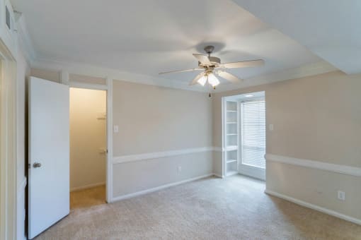 Bedroom with Ceiling Fan and Crown Molding