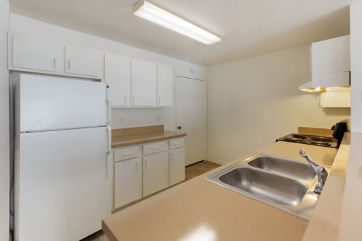 this is a photo of the kitchen of a 560 square foot, 1 bedroom apartment at as