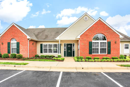 Building Exterior surrounded by shrubbery