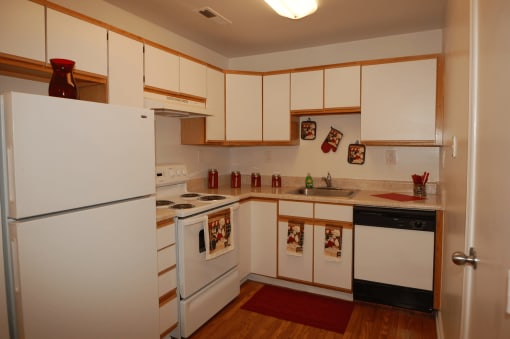 Model Kitchen with White Appliances, White Cabinets at Parkview Apartments, Huntersville, NC