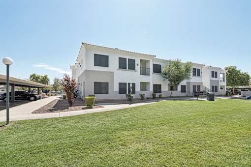 Twostory apartment building with covered parking at Lake Pleasant Village Apartments, Peoria, Arizona