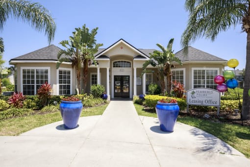 Leasing Office Exterior with Sidewalk, Decorations and Plants
