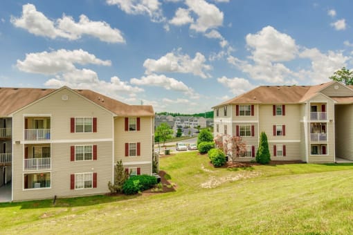 Apartment Building Exterior with Grassy Courtyard