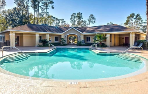 Swimming Pool And Relaxing Area at Holly Cove Apartments, Florida, 32073